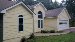 home with new hardie plank siding in yellow