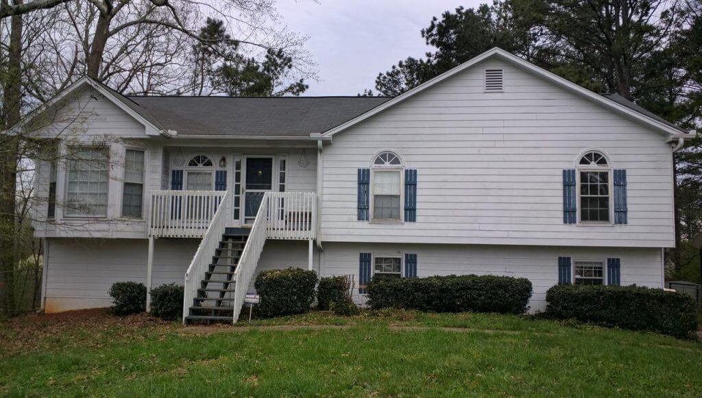home with old siding siding